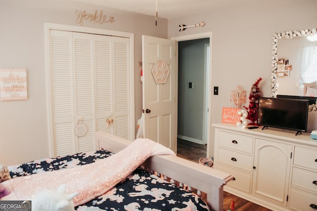 175 Briarwood Cir, Americus, GA 31709 - bedroom with a closet and dark wood finished floors