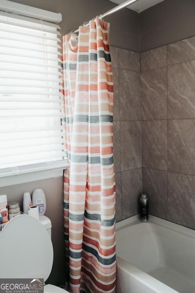 175 Briarwood Cir, Americus, GA 31709 - full bath featuring shower / bathtub combination with curtain and toilet