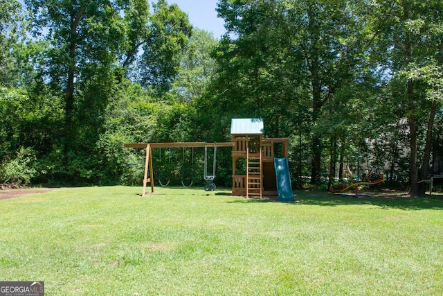 175 Briarwood Cir, Americus, GA 31709 - view of green lawn featuring a playground