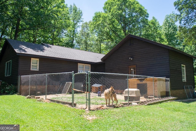 175 Briarwood Cir, Americus, GA 31709 - rear view of house featuring a gate