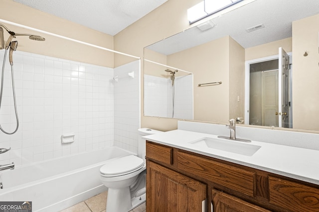 98 Hampshire Ct, Avondale Estates, GA 30002 - bathroom featuring shower / tub combination, vanity, tile patterned flooring, and a textured ceiling