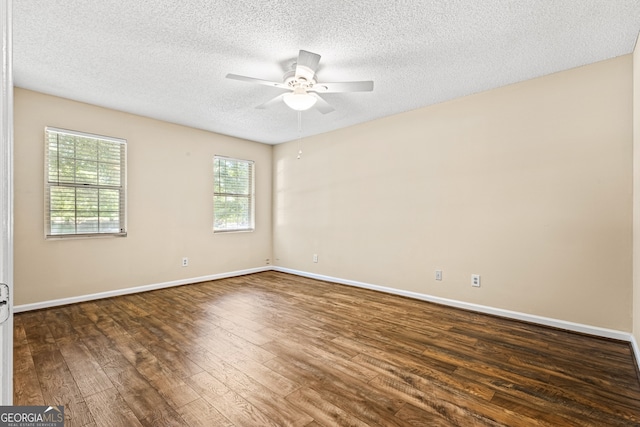 98 Hampshire Ct, Avondale Estates, GA 30002 - spare room featuring ceiling fan, dark wood-style flooring, and a textured ceiling