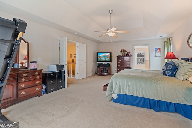 3476 Bridge Walk Dr, Lawrenceville, GA 30044 - carpeted bedroom featuring a tray ceiling and a ceiling fan
