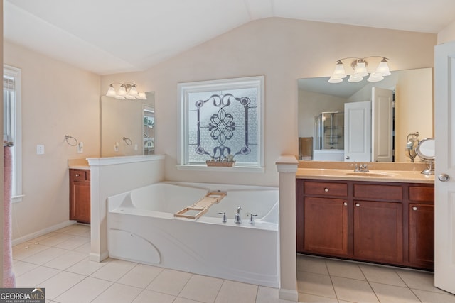3476 Bridge Walk Dr, Lawrenceville, GA 30044 - full bath with lofted ceiling, plenty of natural light, a garden tub, and vanity