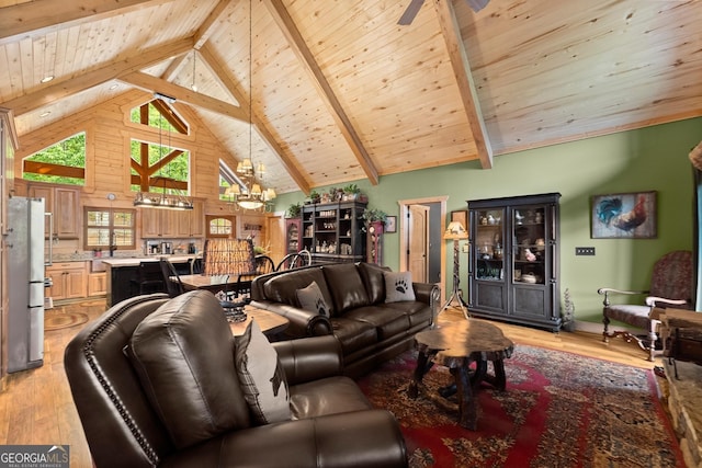 294 Turkey Trl, Jasper, GA 30143 - living room featuring light wood-type flooring, wood ceiling with exposed beams, a chandelier, high vaulted ceiling, and a ceiling fan