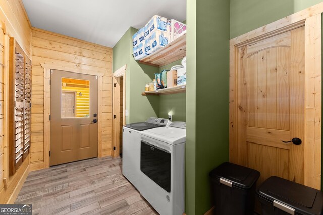 294 Turkey Trl, Jasper, GA 30143 - washroom with washer and clothes dryer, light wood-style flooring, and wood walls