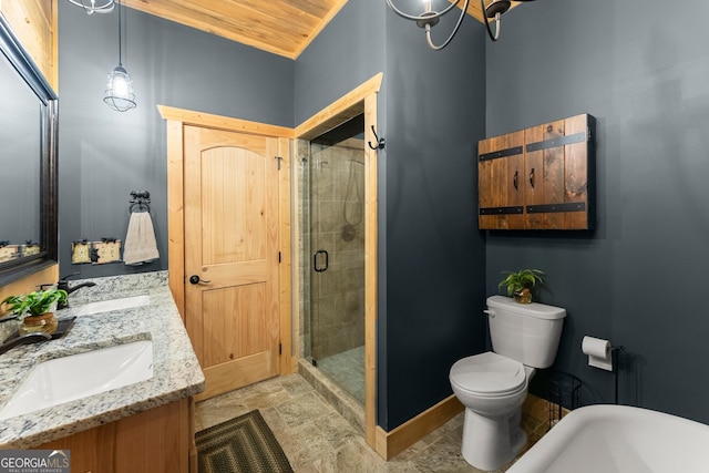 294 Turkey Trl, Jasper, GA 30143 - bathroom with stone finish floors, double vanity, toilet, a stall shower, and baseboards