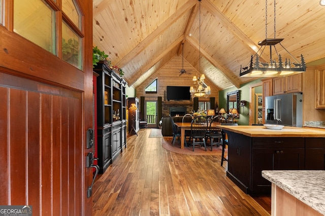 294 Turkey Trl, Jasper, GA 30143 - kitchen with high end refrigerator, butcher block countertops, wood ceiling with exposed beams, dark wood finished floors, and open floor plan