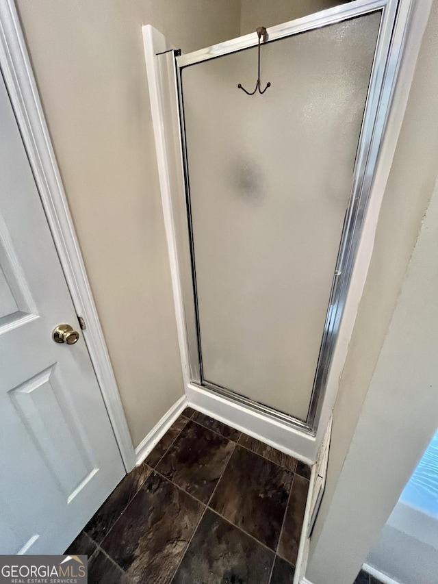 11657 Flemming Ct, Hampton, GA 30228 - bathroom with a stall shower