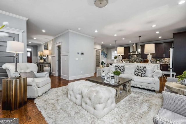 2603 Apple Valley Rd NE, Atlanta, GA 30319 - living room featuring dark wood-style flooring, ornamental molding, recessed lighting, and plenty of natural light
