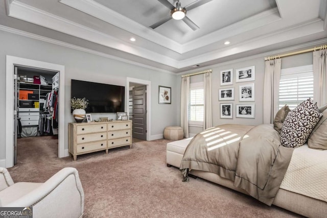 2603 Apple Valley Rd NE, Atlanta, GA 30319 - bedroom featuring a tray ceiling, a spacious closet, ornamental molding, carpet floors, and a closet