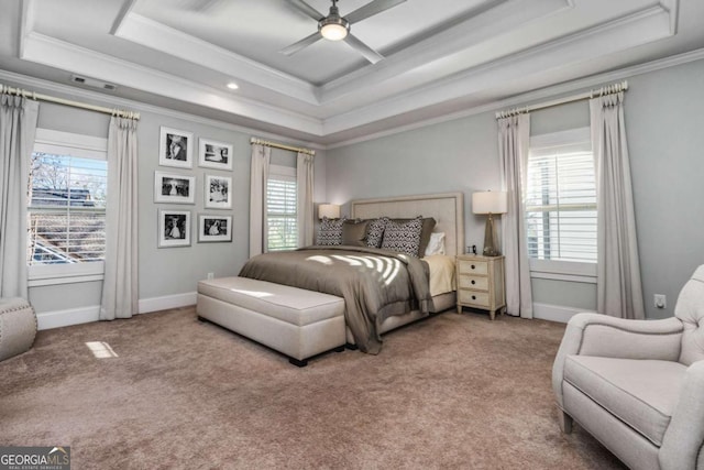 2603 Apple Valley Rd NE, Atlanta, GA 30319 - carpeted bedroom featuring a tray ceiling, multiple windows, ornamental molding, ceiling fan, and recessed lighting