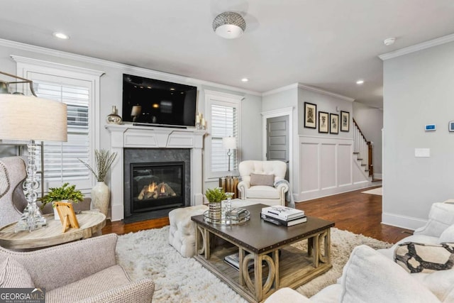 2603 Apple Valley Rd NE, Atlanta, GA 30319 - living area with stairs, a high end fireplace, wood finished floors, crown molding, and recessed lighting