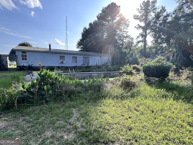 542 Southern Pines Rd, Dublin, GA 31021 - back of property featuring metal roof
