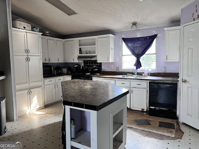542 Southern Pines Rd, Dublin, GA 31021 - kitchen featuring open shelves, black appliances, under cabinet range hood, a sink, and dark countertops