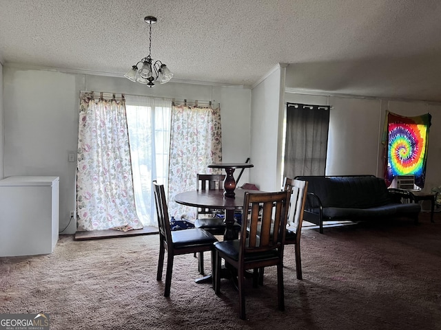 542 Southern Pines Rd, Dublin, GA 31021 - dining area featuring carpet floors, a chandelier, a textured ceiling, and ornamental molding