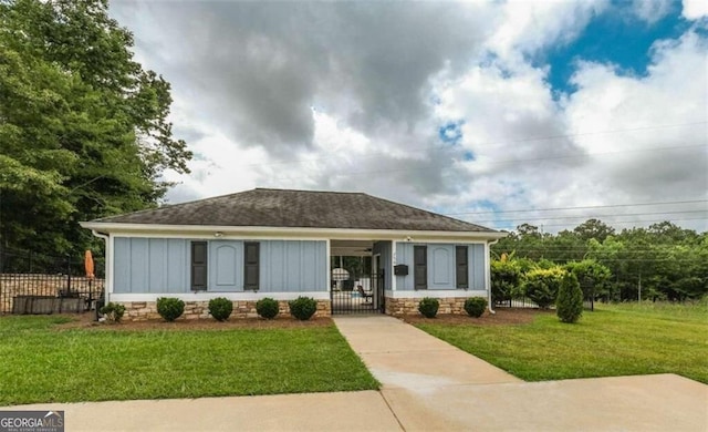 720 Tucker Trl, Bremen, GA 30110 - view of front of home featuring board and batten siding, a gate, and roof with shingles