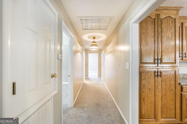 4407 Jones Rd, Macon, GA 31216 - hall with carpet, attic access, and baseboards