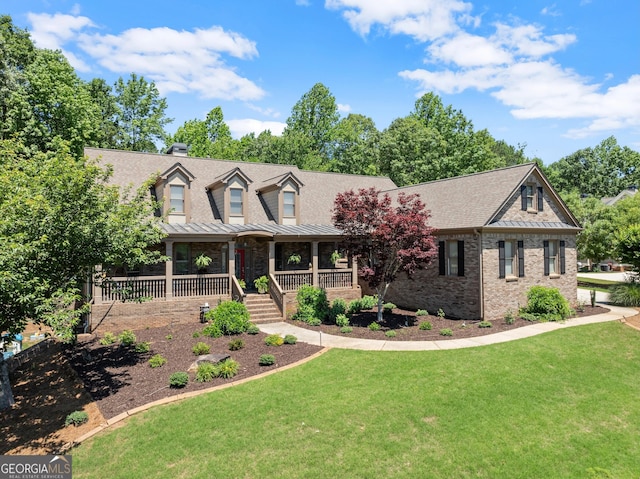 5176 Glen Forrest Dr, Flowery Branch, GA 30542 - cape cod-style house with a porch, a front lawn, brick siding, and roof with shingles