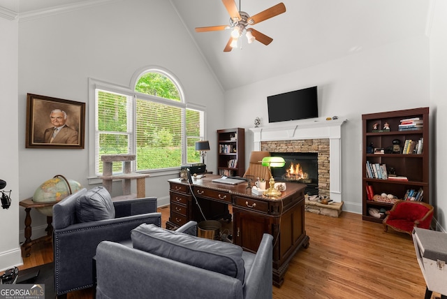 5176 Glen Forrest Dr, Flowery Branch, GA 30542 - home office with ceiling fan, wood finished floors, high vaulted ceiling, a stone fireplace, and baseboards