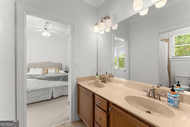 5176 Glen Forrest Dr, Flowery Branch, GA 30542 - full bathroom with connected bathroom, crown molding, double vanity, tile patterned floors, and a ceiling fan