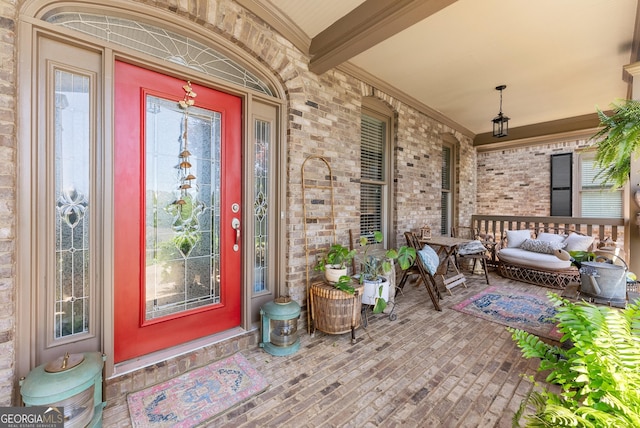 5176 Glen Forrest Dr, Flowery Branch, GA 30542 - property entrance featuring a porch and brick siding