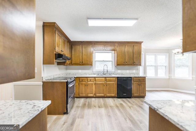757 Silver Springs Dr, Macon, GA 31210 - kitchen with dishwasher, stainless steel electric range, under cabinet range hood, brown cabinetry, and light wood finished floors