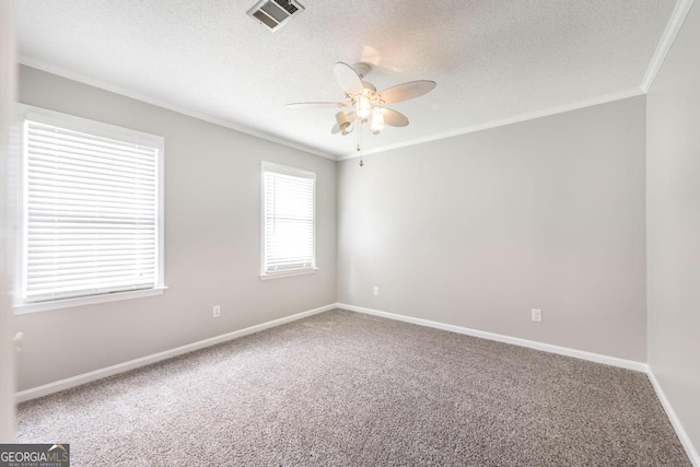 757 Silver Springs Dr, Macon, GA 31210 - carpeted spare room featuring ornamental molding, ceiling fan, a textured ceiling, and baseboards