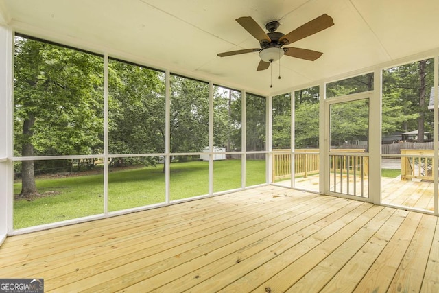 757 Silver Springs Dr, Macon, GA 31210 - unfurnished sunroom featuring a ceiling fan and view of scattered trees