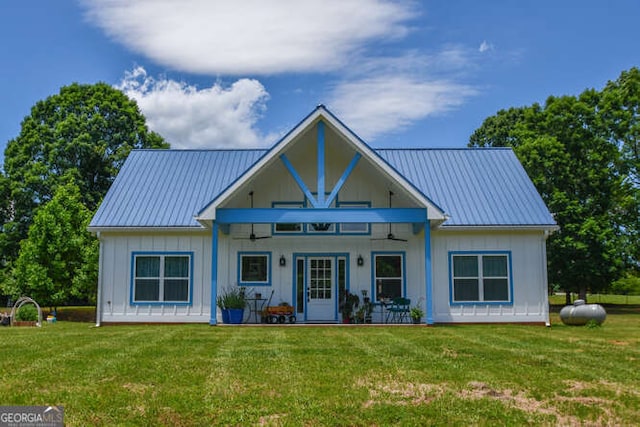 132 Fairview Meadows Dr, Demorest, GA 30535 - view of front of home with board and batten siding, a front lawn, and a metal roof