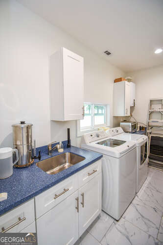132 Fairview Meadows Dr, Demorest, GA 30535 - laundry room featuring independent washer and dryer, light marble finish flooring, recessed lighting, and cabinet space