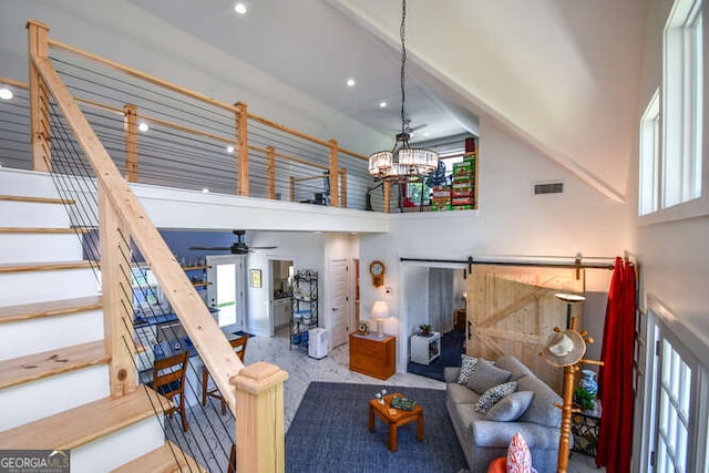 132 Fairview Meadows Dr, Demorest, GA 30535 - living area with a towering ceiling, a chandelier, recessed lighting, stairs, and a ceiling fan