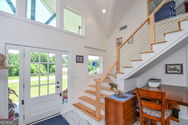 132 Fairview Meadows Dr, Demorest, GA 30535 - foyer with stairway, marble finish floors, healthy amount of natural light, high vaulted ceiling, and recessed lighting