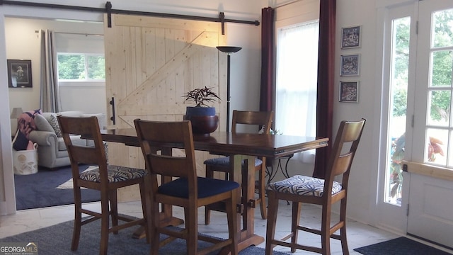 132 Fairview Meadows Dr, Demorest, GA 30535 - dining room featuring marble finish floors and a barn door