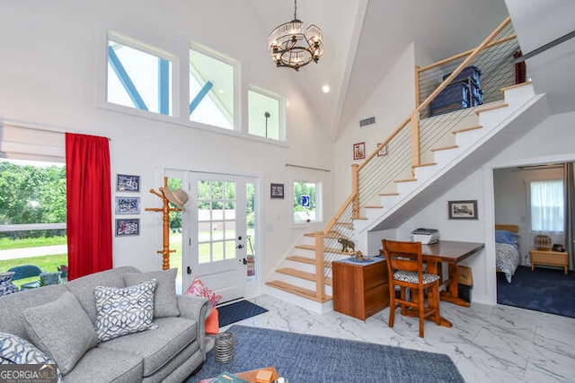 132 Fairview Meadows Dr, Demorest, GA 30535 - living area with marble finish floors, a towering ceiling, stairway, a chandelier, and recessed lighting