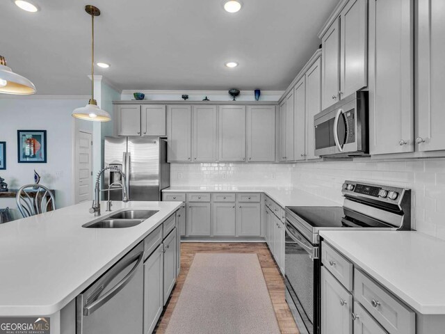 103 Crowley Dr, Calhoun, GA 30701 - kitchen with appliances with stainless steel finishes, gray cabinetry, ornamental molding, light countertops, and recessed lighting