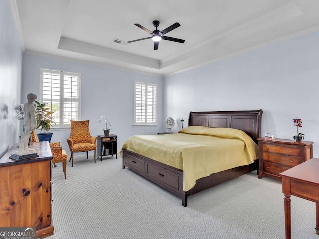 103 Crowley Dr, Calhoun, GA 30701 - bedroom featuring a raised ceiling, light carpet, multiple windows, crown molding, and a ceiling fan