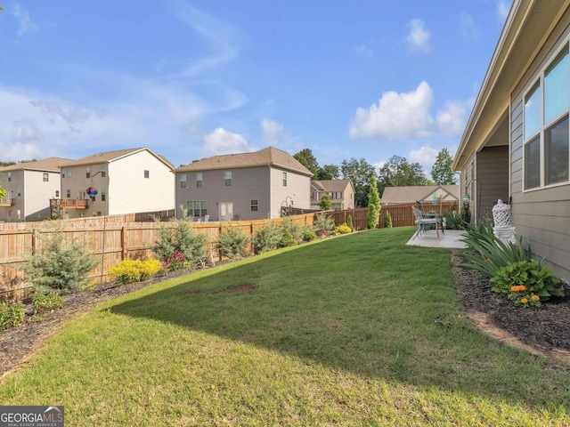 103 Crowley Dr, Calhoun, GA 30701 - fenced backyard featuring a residential view and a patio area