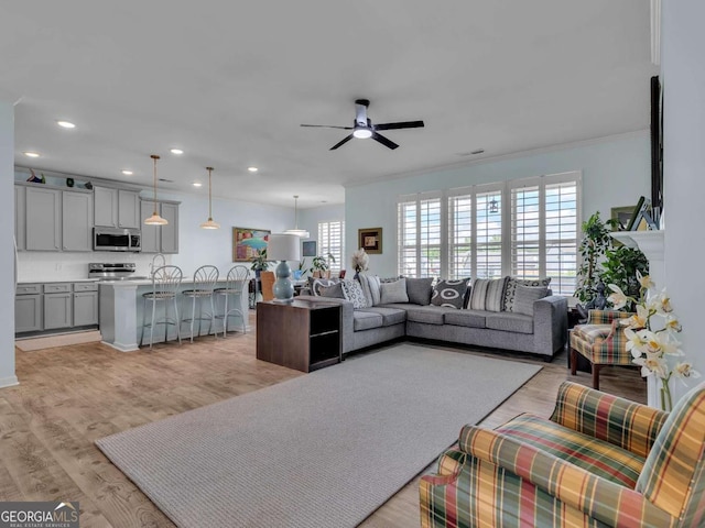 103 Crowley Dr, Calhoun, GA 30701 - living room with plenty of natural light, a ceiling fan, recessed lighting, light wood-style floors, and crown molding