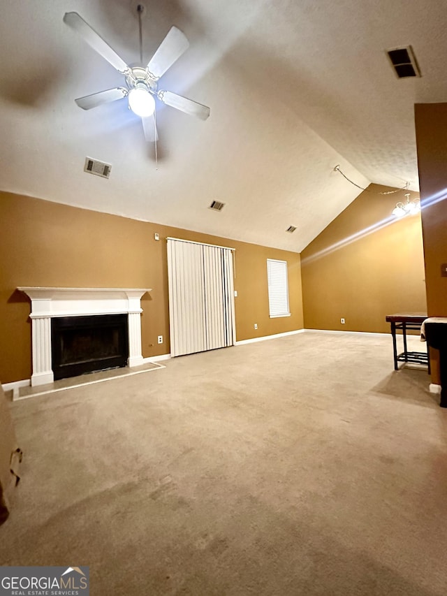 3793 SW Mays Ct SW, Atlanta, GA 30331 - unfurnished living room with vaulted ceiling, a fireplace with raised hearth, carpet floors, baseboards, and ceiling fan