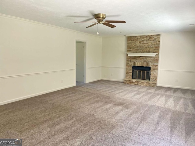1028 Gate Post Ln, Lawrenceville, GA 30044 - unfurnished living room with a ceiling fan, crown molding, carpet, a fireplace, and baseboards