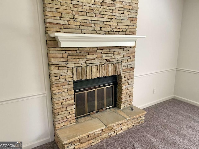 1028 Gate Post Ln, Lawrenceville, GA 30044 - detailed view of carpet flooring, a fireplace, and baseboards