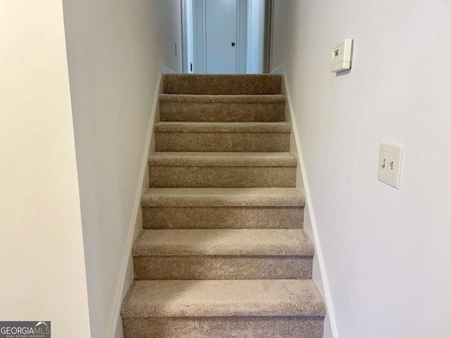 1028 Gate Post Ln, Lawrenceville, GA 30044 - stairway with baseboards