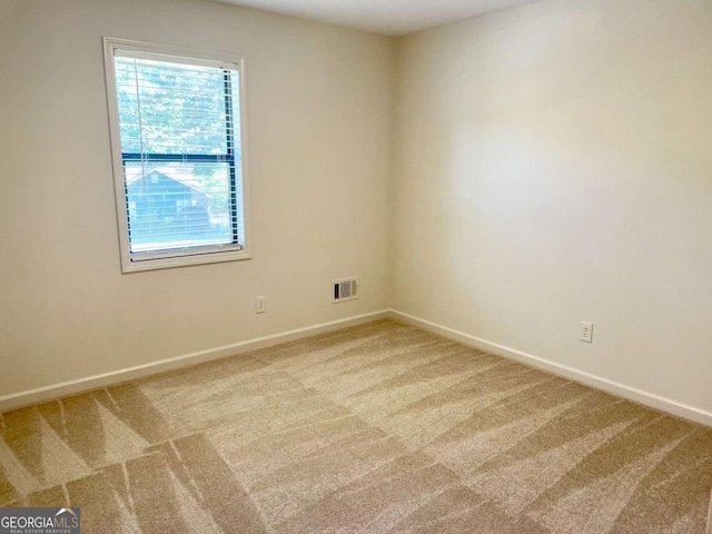 1028 Gate Post Ln, Lawrenceville, GA 30044 - carpeted spare room with baseboards