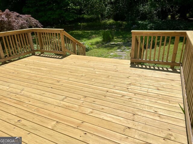 1028 Gate Post Ln, Lawrenceville, GA 30044 - wooden deck featuring view of wooded area