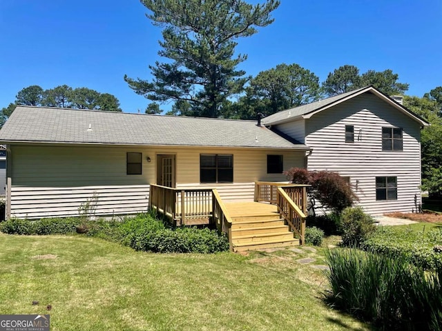 1028 Gate Post Ln, Lawrenceville, GA 30044 - view of front of house with a wooden deck and a front lawn