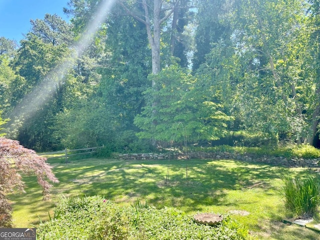 1028 Gate Post Ln, Lawrenceville, GA 30044 - view of green lawn with a view of trees