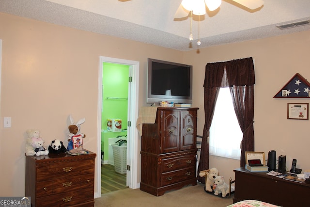 239 Ferguson Ave, Locust Grove, GA 30248 - bedroom with carpet flooring, ensuite bathroom, and a ceiling fan