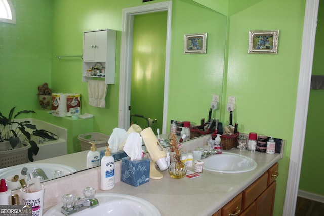 239 Ferguson Ave, Locust Grove, GA 30248 - bathroom featuring double vanity