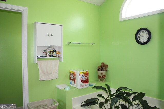 239 Ferguson Ave, Locust Grove, GA 30248 - bathroom with baseboards